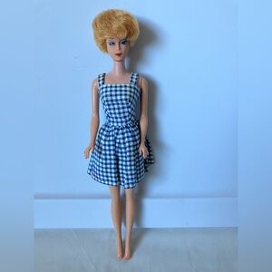 Vintage 1960s Early Light Red Bubblecut Barbie Doll. Not tagged dress.